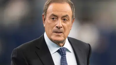 Al Michaels in a suit and tie
