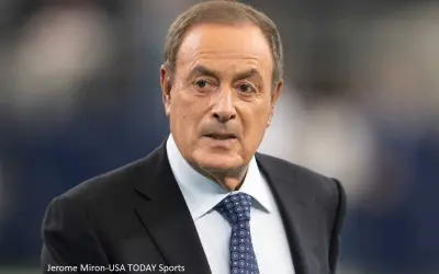 Al Michaels in a suit and tie