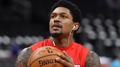 Bradley Beal holds a ball