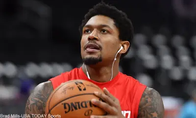 Bradley Beal holds a ball
