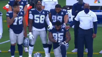 Dontari Poe kneel