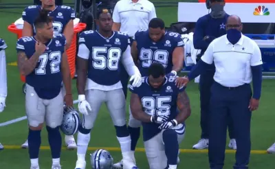Dontari Poe kneel