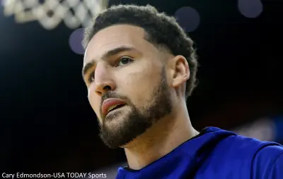 Klay Thompson wearing warmups