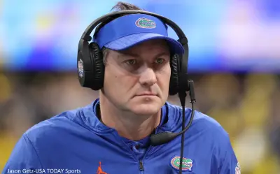 Dan Mullen with a headset on