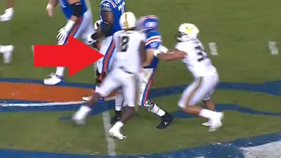 Trajan Jeffcoat hit Kyle Trask