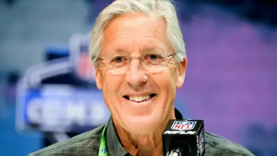 Pete Carroll smiles at a press conference