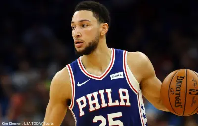 Ben Simmons handling a basketball
