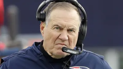 Bill Belichick with a headset