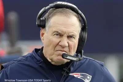 Bill Belichick with a headset