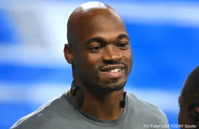 Adrian Peterson smiles