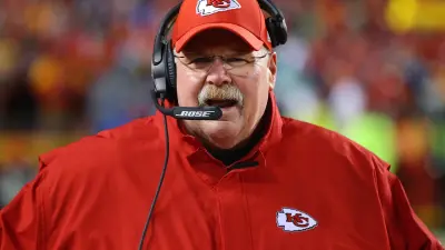 Andy Reid with a headset on