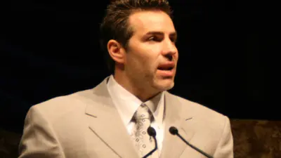 Kurt Warner in a suit