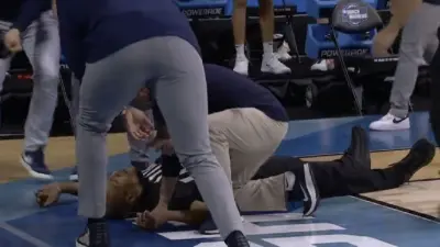 Referee Bert Smith