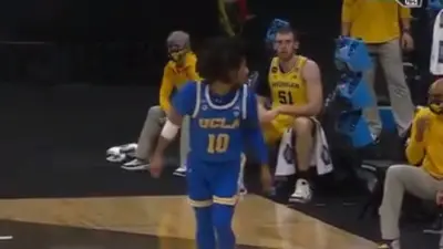 Tyger Campbell Michigan bench