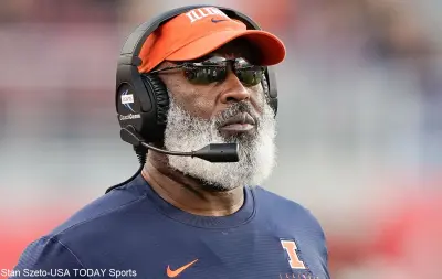 Lovie Smith with a headset on