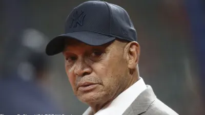 Reggie Jackson in a baseball cap