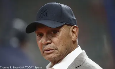 Reggie Jackson in a baseball cap