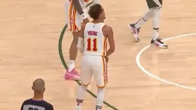 Trae Young shoulder shimmy