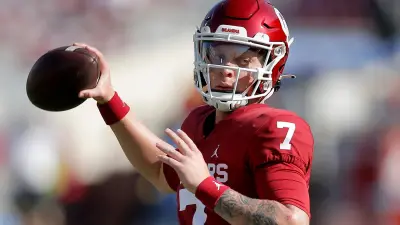 Spencer Rattler holds a ball