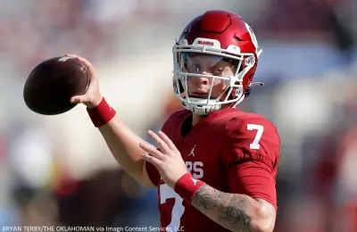 Spencer Rattler holds a ball