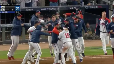 Atlanta Braves celebrate their walk-off hit