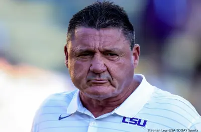 Ed Orgeron in a white LSU shirt