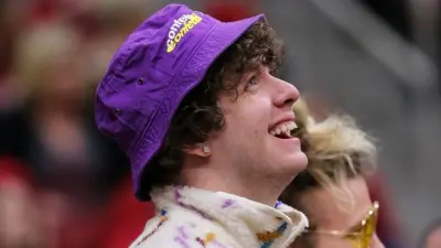 Jack Harlow attending a game