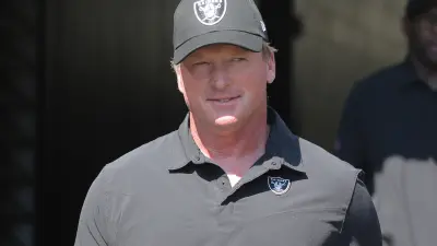 Jon Gruden in a Raiders hat
