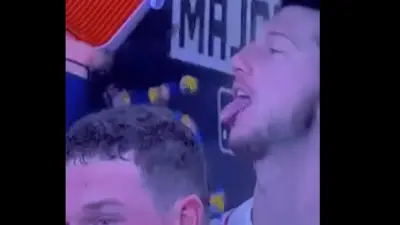 Kyle Tucker sticks his tongue out at gum