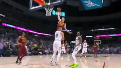 Lauri Markkanen dunks on Nikola Jokic
