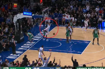 Obi Toppin hangs on the rim