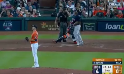 Rafael Devers watches his ball