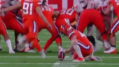 Syracuse prepares to attempt a field goal