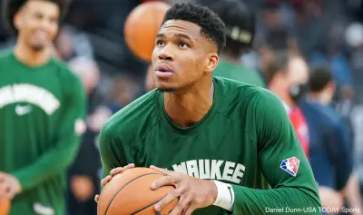 Giannis Antetokounmpo warms up