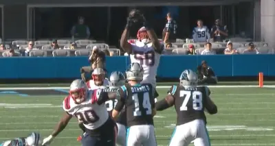 Jamie Collins intercepts a pass