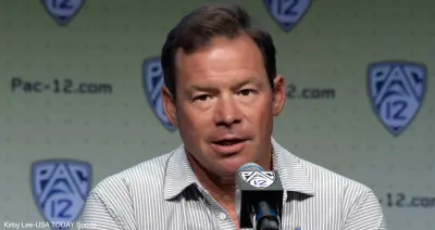 Jim Mora at a press conference