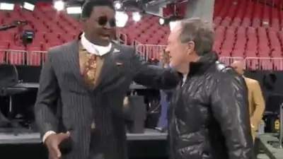 Michael Irvin chats with Bill Belichick