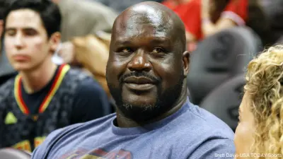 Shaq sitting courtside