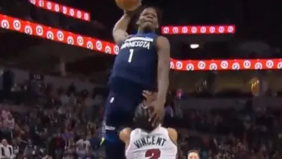 Anthony Edwards dunks over Gabe Vincent