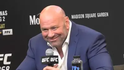 Dana White grins