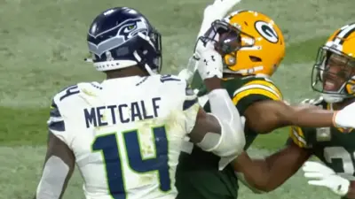 DK Metcalf grabs Henry Black