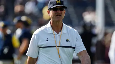 Jim Harbaugh walking