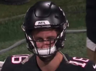 Josh Rosen with his awkward helmet
