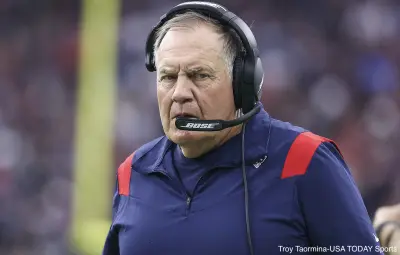Bill Belichick looks on from the sideline
