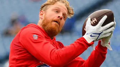 Cole Beasley catches a pass in warmups