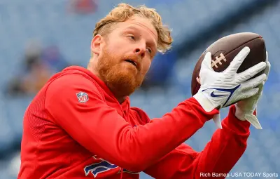 Cole Beasley catches a pass in warmups
