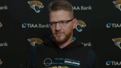 Darrell Bevell at a press conference