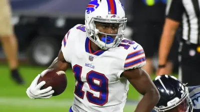 Isaiah McKenzie runs with the ball