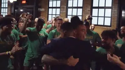 Marcus Freeman greeted by players