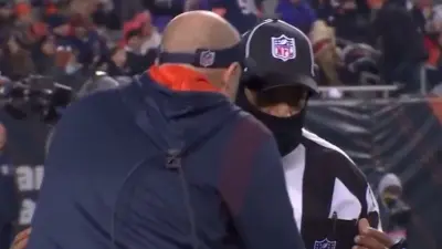 Matt Nagy argues with an official